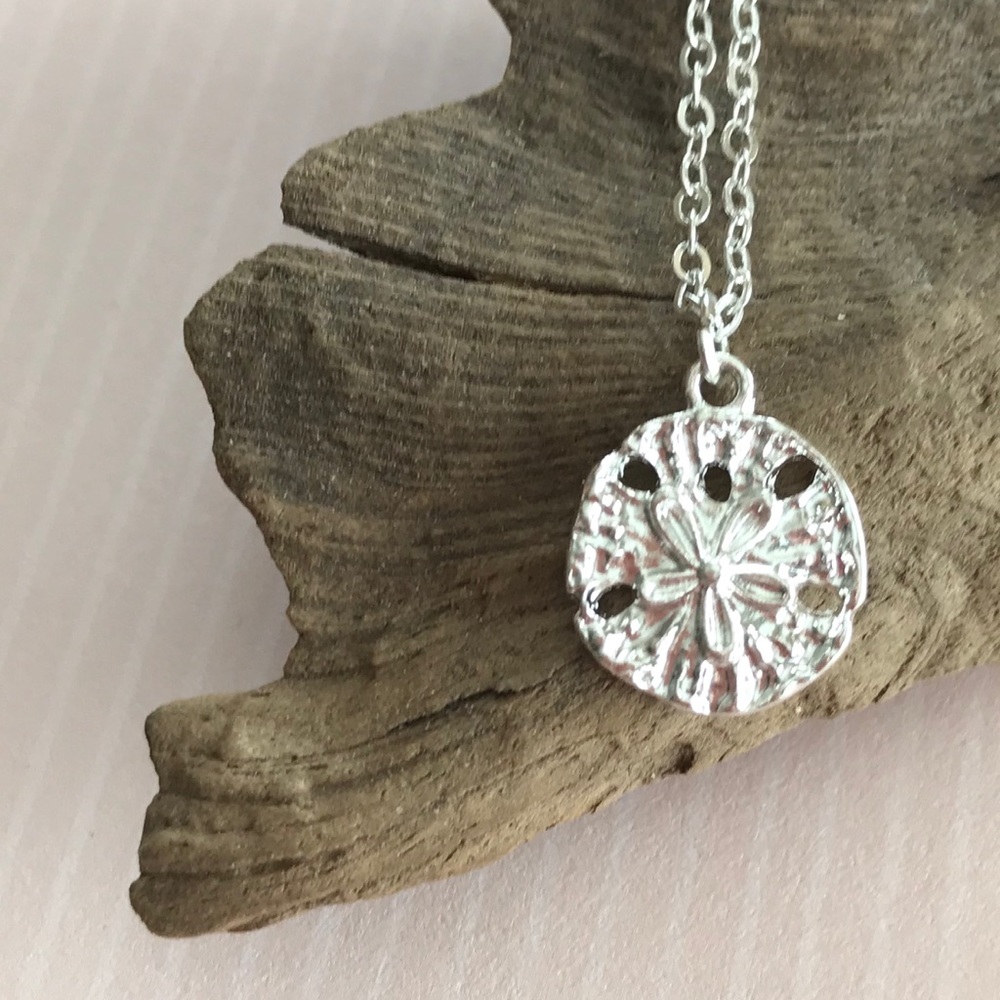 New Silver sand dollar necklace
